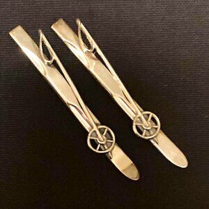 Delightful twin ski brooches signed Beau Sterling